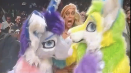 Tyra Banks and two furries at the Brooklyn Nets game